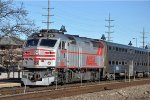 Westbound commuter comes into the station behind the Burlington heritage unit